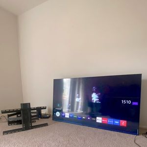 65 Samsung Tv w wall mount couch dresser chair everything 450 now negotiable
